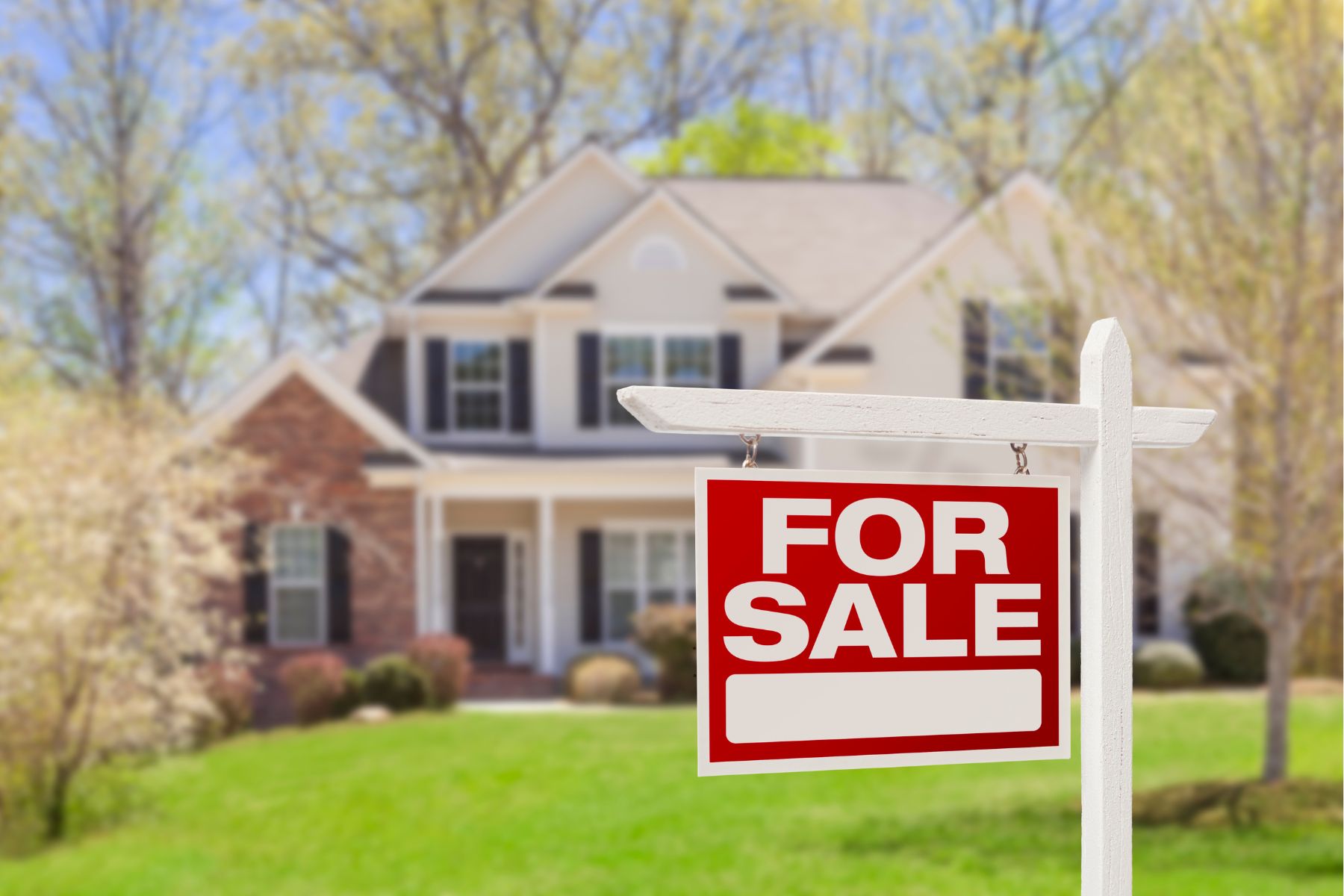 Two-story home with a For Sale sign in the front yard in Hendricks County, Indiana