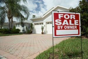 For Sale By Owner sign in front of a residential home — FSBO vs. REALTOR® in Indiana