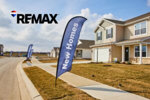 New construction homes with New Homes flags in a Hendricks County, Indiana subdivision, RE/MAX branding